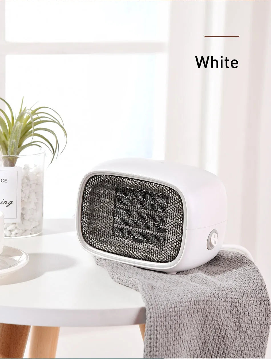 Mini PTC ceramic heater in green, white or yellow colours showing compact dimensions