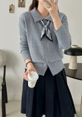 Ladies' grey lapel scarf cardigan sweater on a hanger