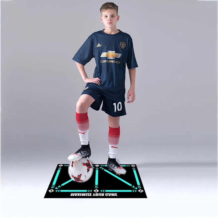 Black non-slip football training mat measuring 60 by 90 centimetres.