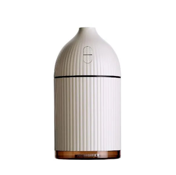 White ultrasonic aromatherapy diffuser and humidifier with LED light, 300ml capacity, and USB cable