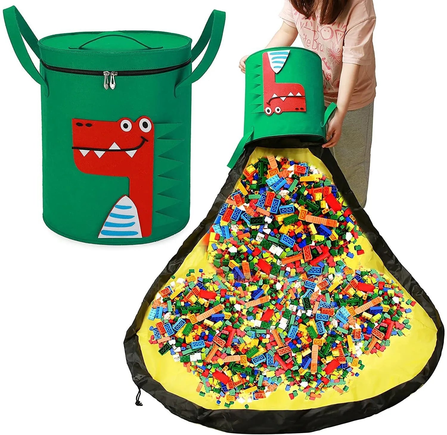 Green felt cube storage bag open as a play mat next to toys, showing pull rope closure