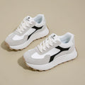 Women's low-top platform sneakers in card black with lace-up front and rubber sole