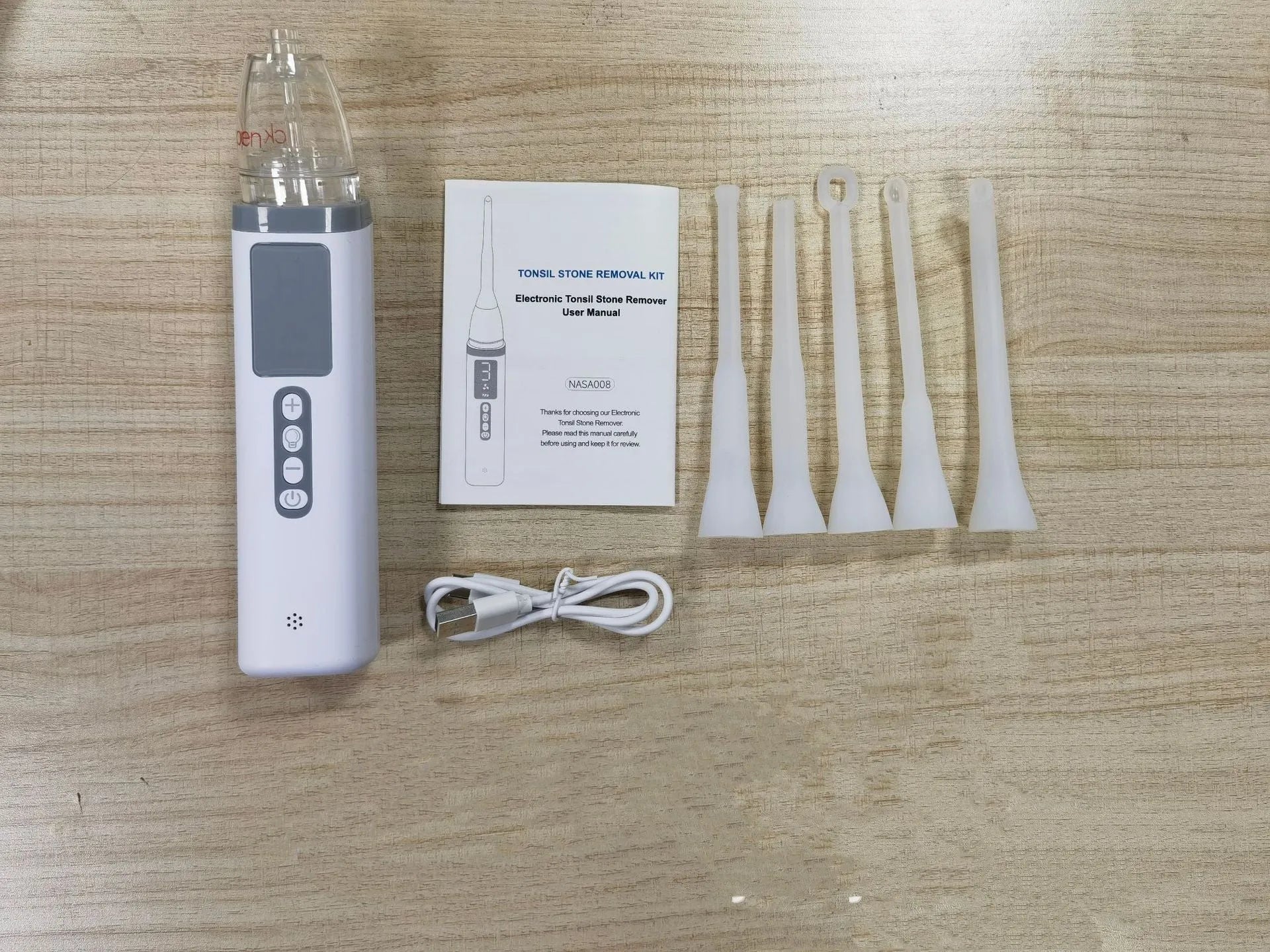 Cross-border tonsillar extractor oral cleaning tool in milky white for dental stone removal