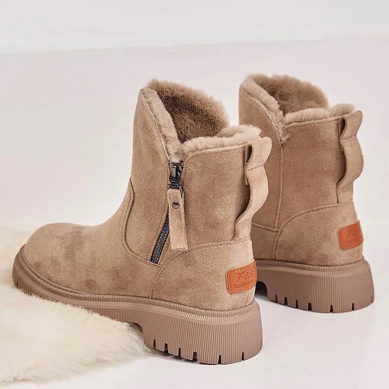 Women's black faux suede snow boots with high top, square heel, and side zipper closure