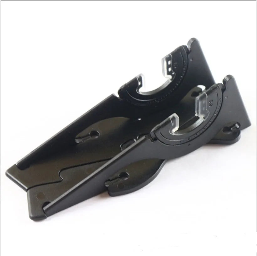Plastic card-type mobile phone stand in six colour options on a desktop