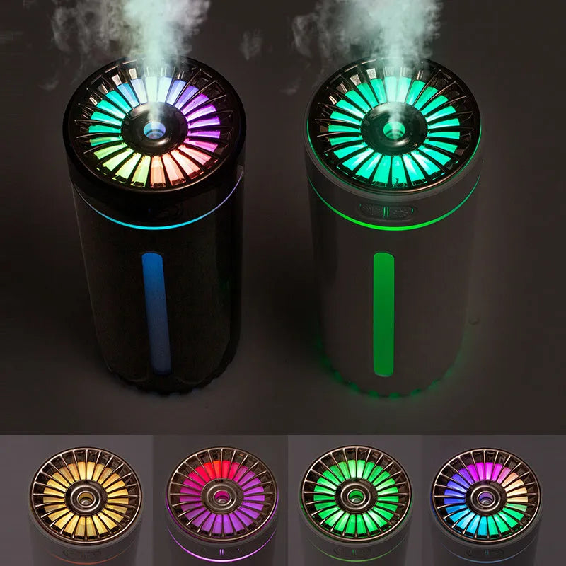 Black portable USB humidifier with colourful lights on car dashboard