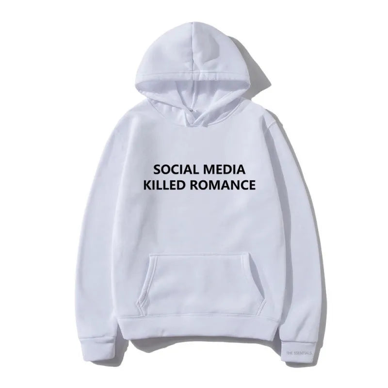 Man wearing a slim fit, long sleeve hoodie with a printed spring letter pattern on the front.