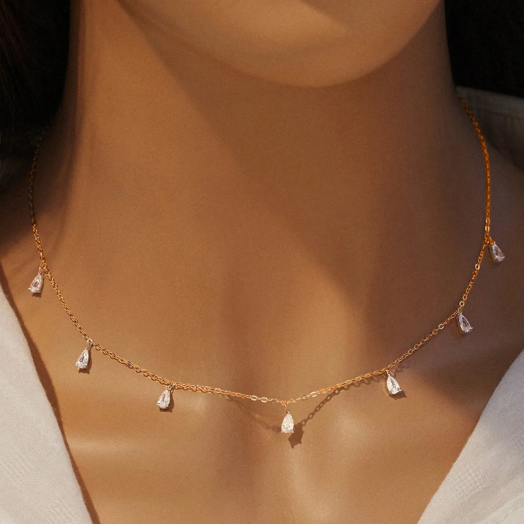 Gentle drop-shaped artificial zircon pendant on an adjustable 925 silver O-chain necklace.