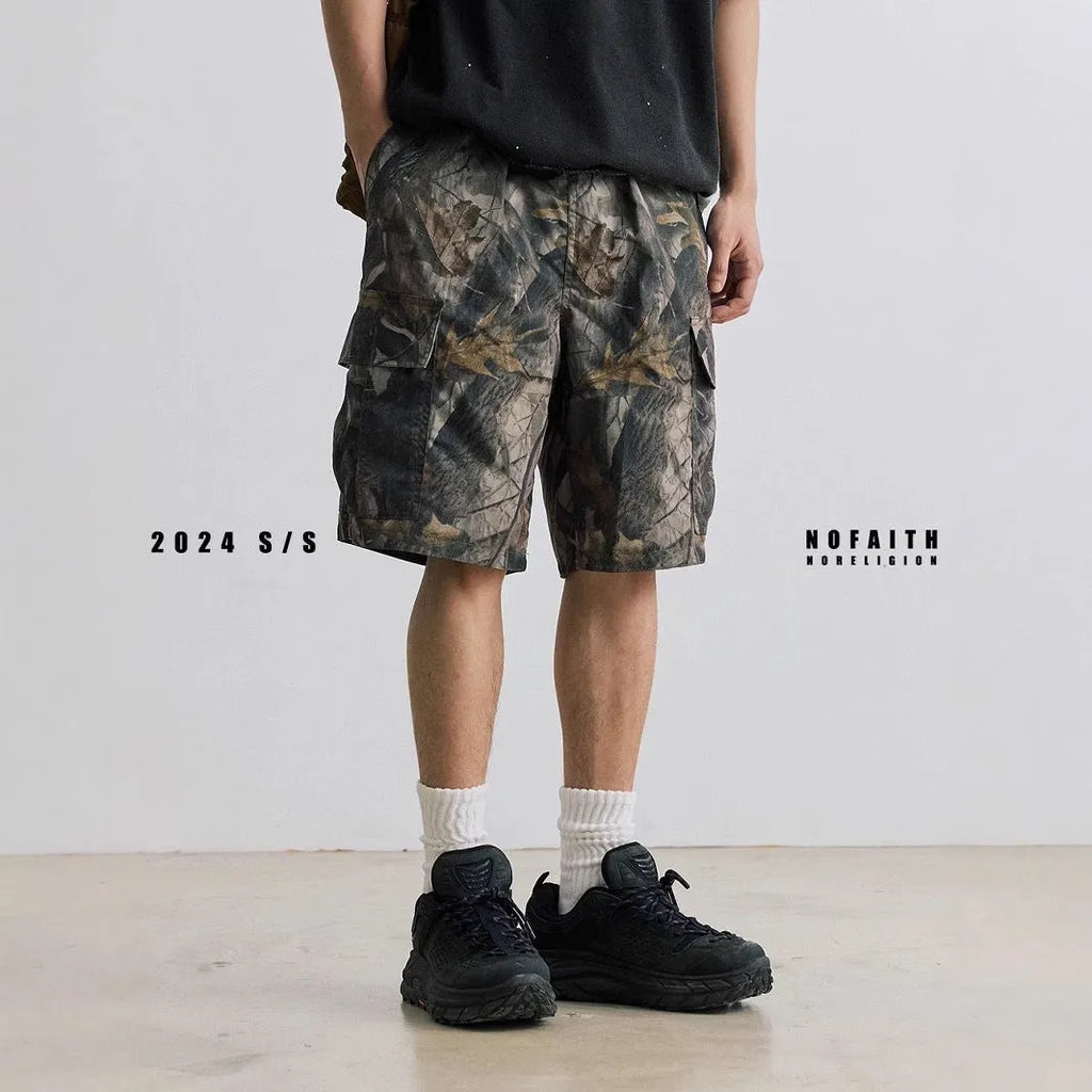 Loose casual straight-leg denim shorts in army green with zip placket closure