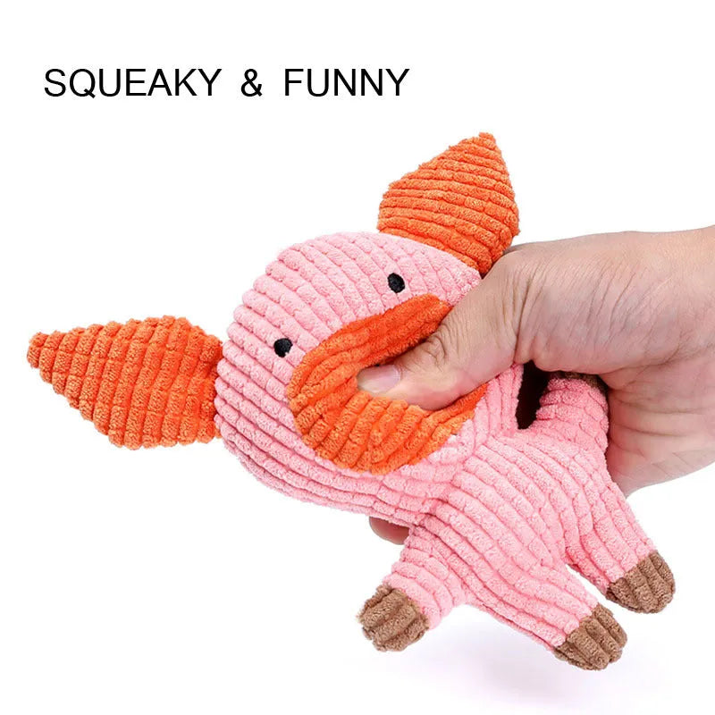 Colourful animal-shaped plush dog chew toy with squeaker for small dogs.