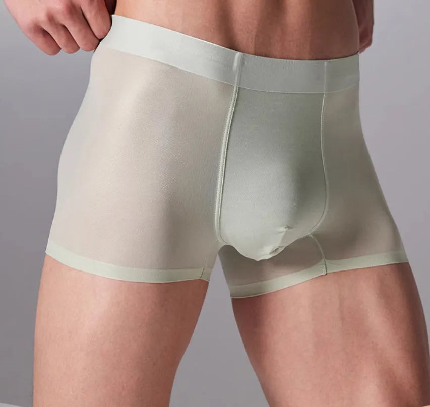Men's seamless fitness shorts in black, shown flat, highlighting the lightweight fabric and lack of seams.