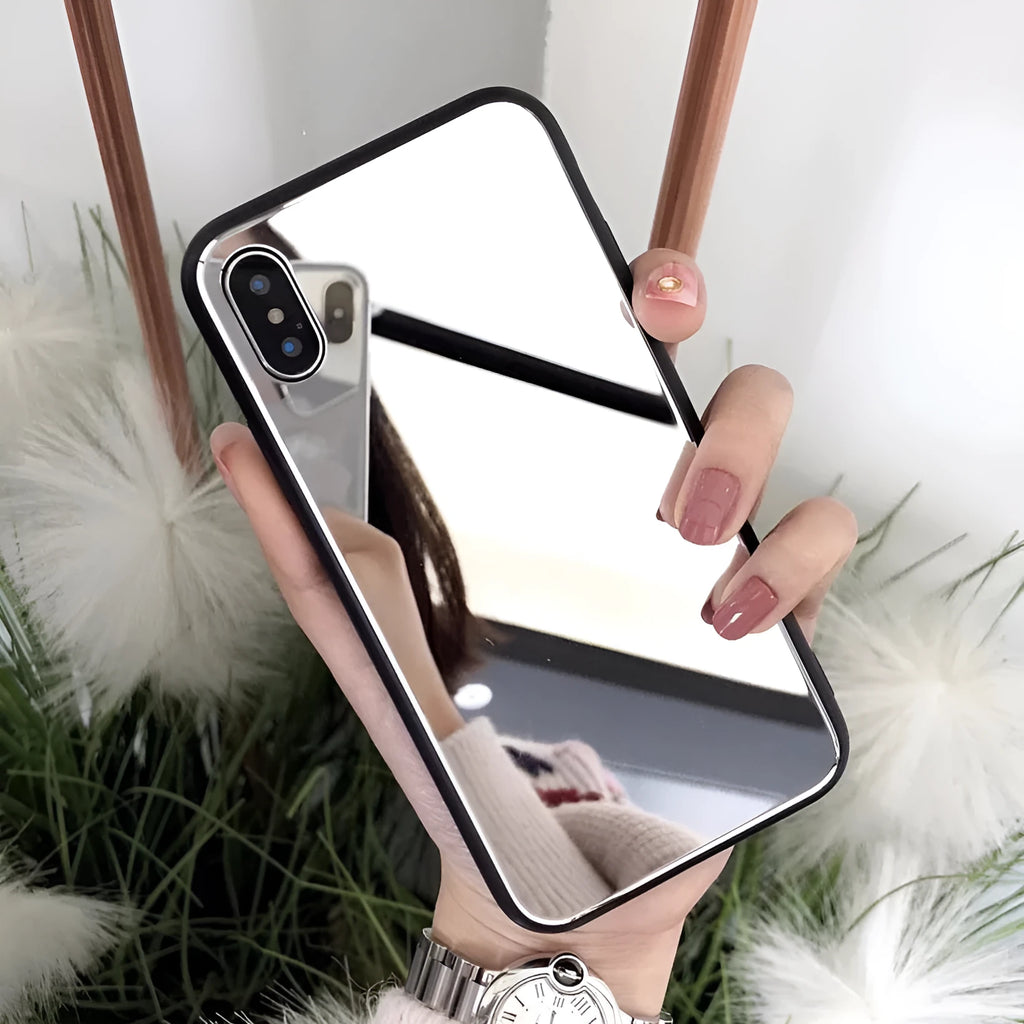 Black iPhone mirror case showing reflective surface on back, compatible with multiple iPhone models