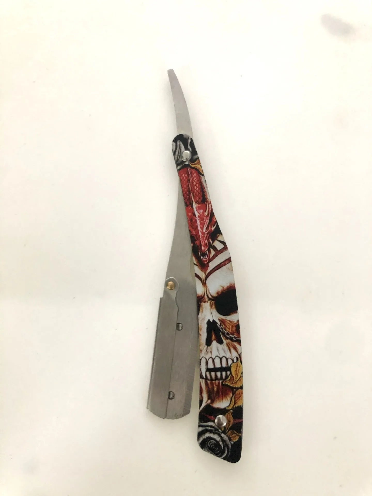 Manual shaver with clown skull design, 74 blade, red pattern black colour option