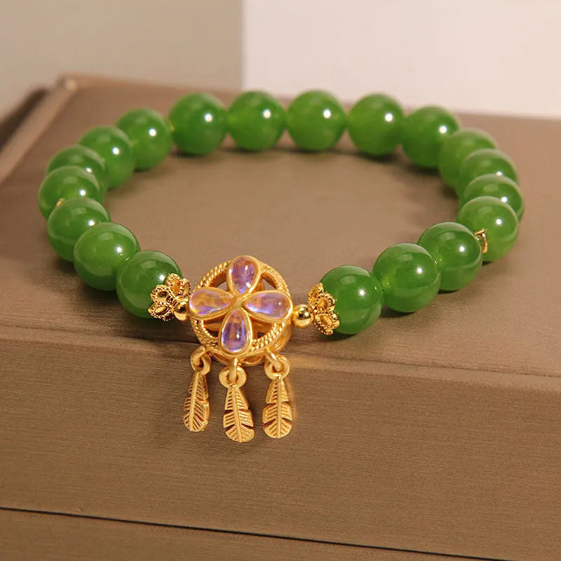 Original women's bracelet with a green jasper crystal four-leaf clover dream catcher pendant.