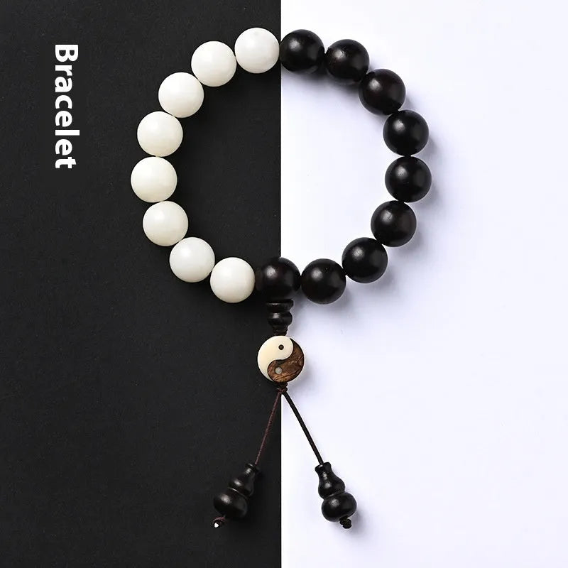 White Corypha Umbraculifera Blackwood and Bodhi seed bracelet with eight-diagram yuan beads.