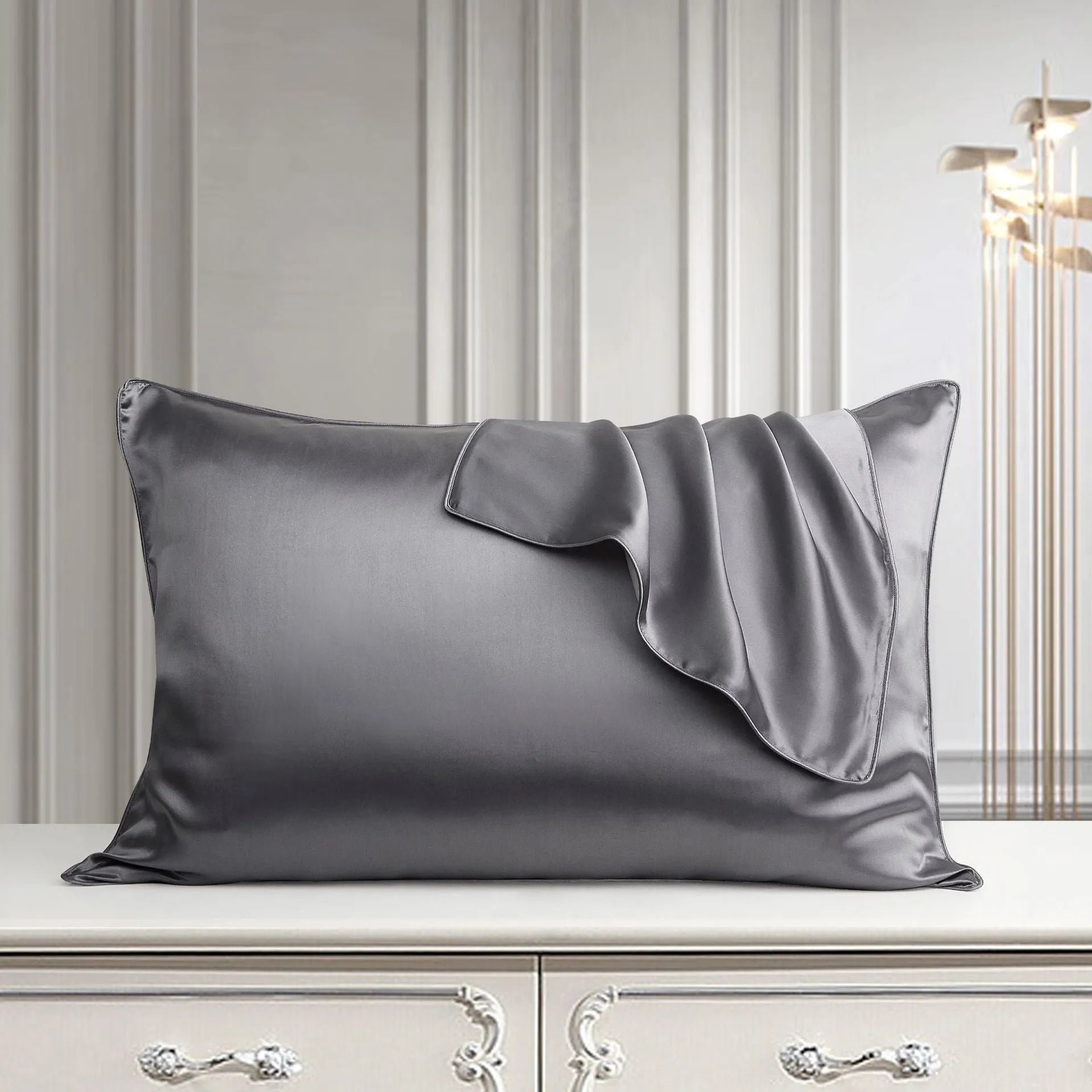 Single mulberry silk pillowcase in palace luxury style, shown in a selection of available colours.