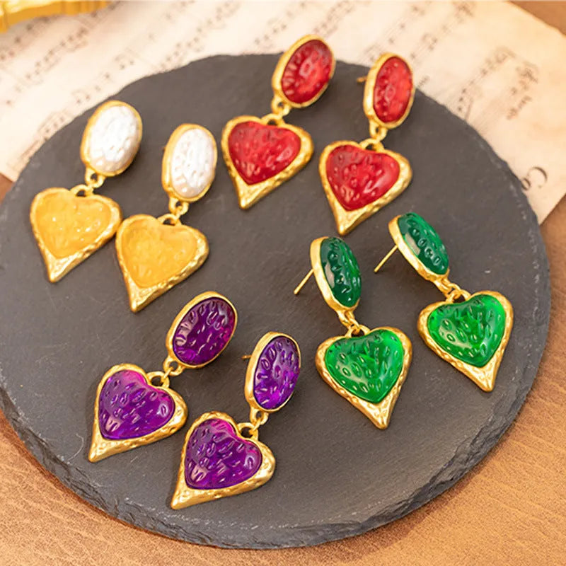 Silver needle pleated oval love heart stud earrings in purple, red, green, and yellow and white colours.