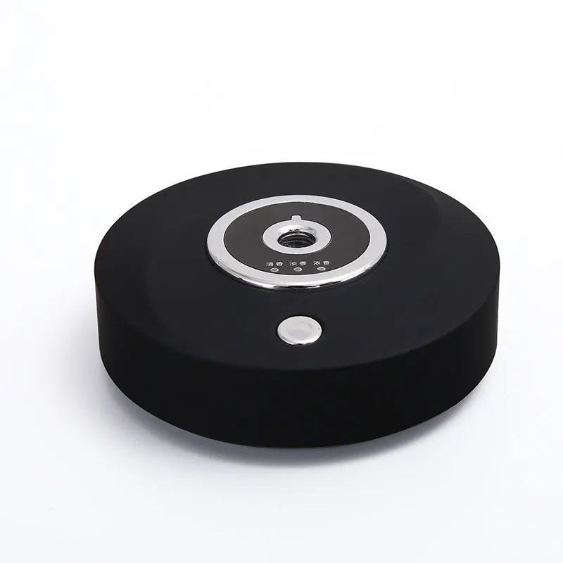 USB-powered car air freshener diffuser with plastic housing in choice of black, grey, or white colours