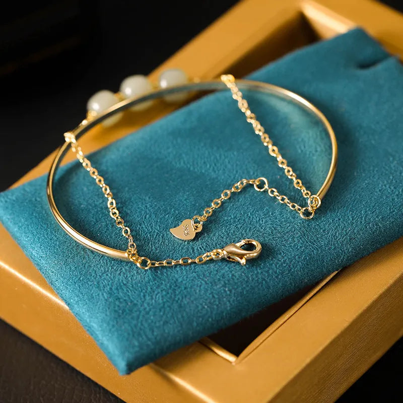 Jade lucky beads bracelet for women with gold inlay decoration, showing single, double, and three beads version options.