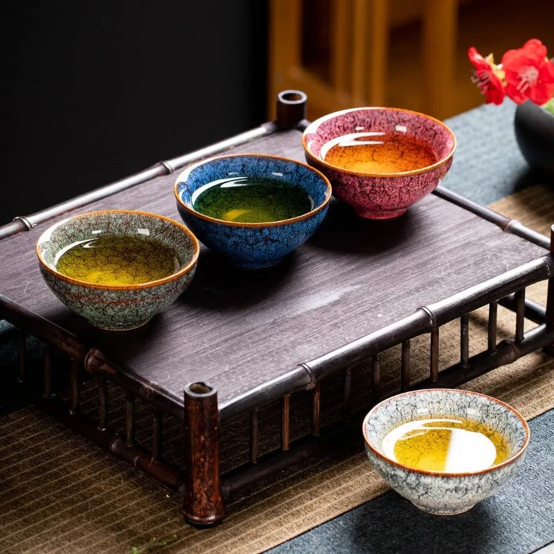 Four ceramic Kung Fu tea cups in a light colour gift box, new Chinese style household tea set.