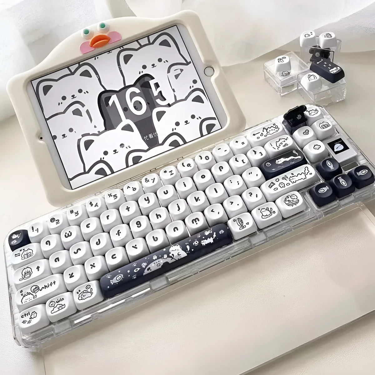 Black and white MOA height key cap set with kitten fantasy design on a mechanical keyboard