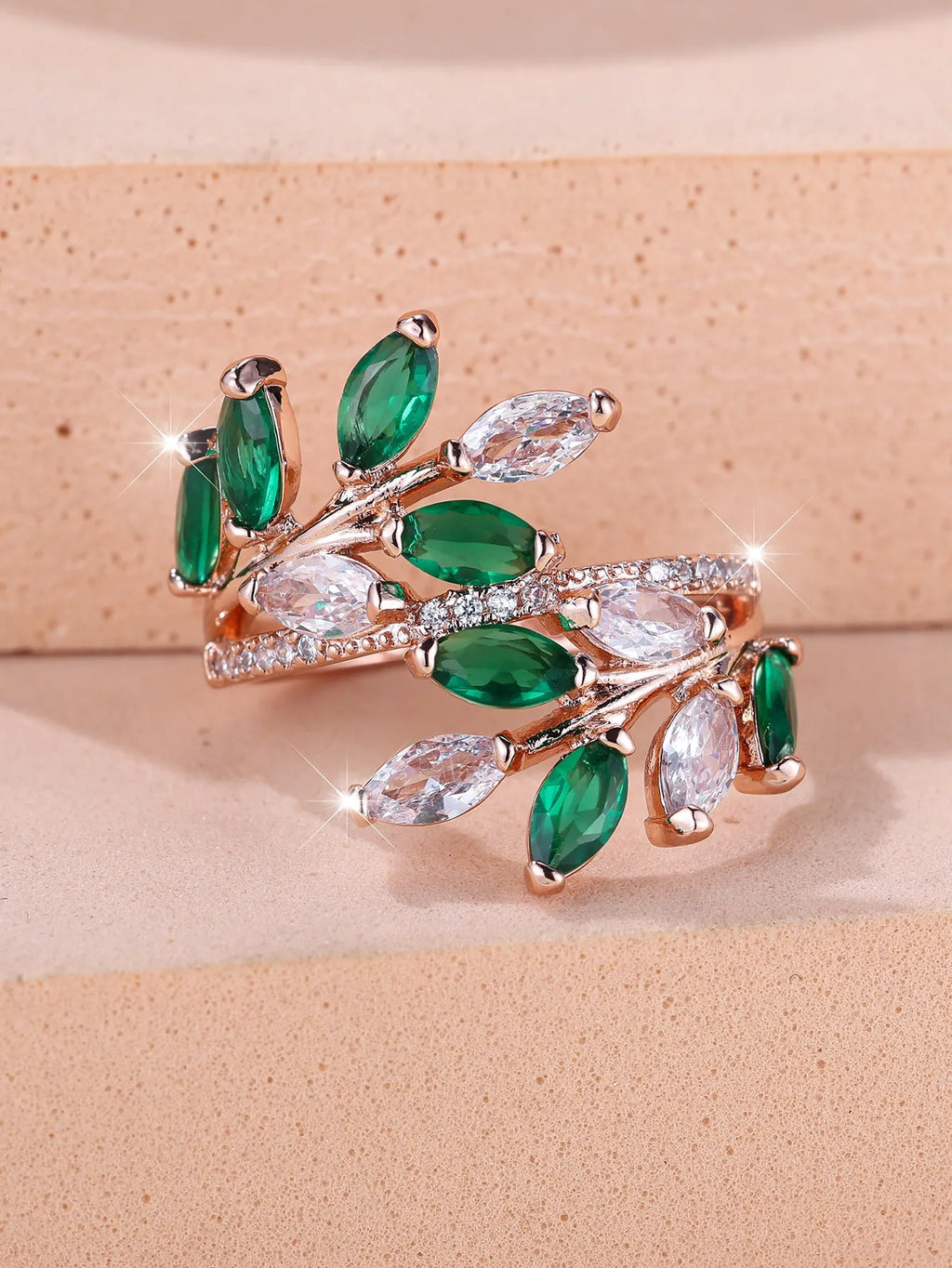 Adjustable leaf-shaped ring with horse eye cubic zirconia design in copper with rose gold plating