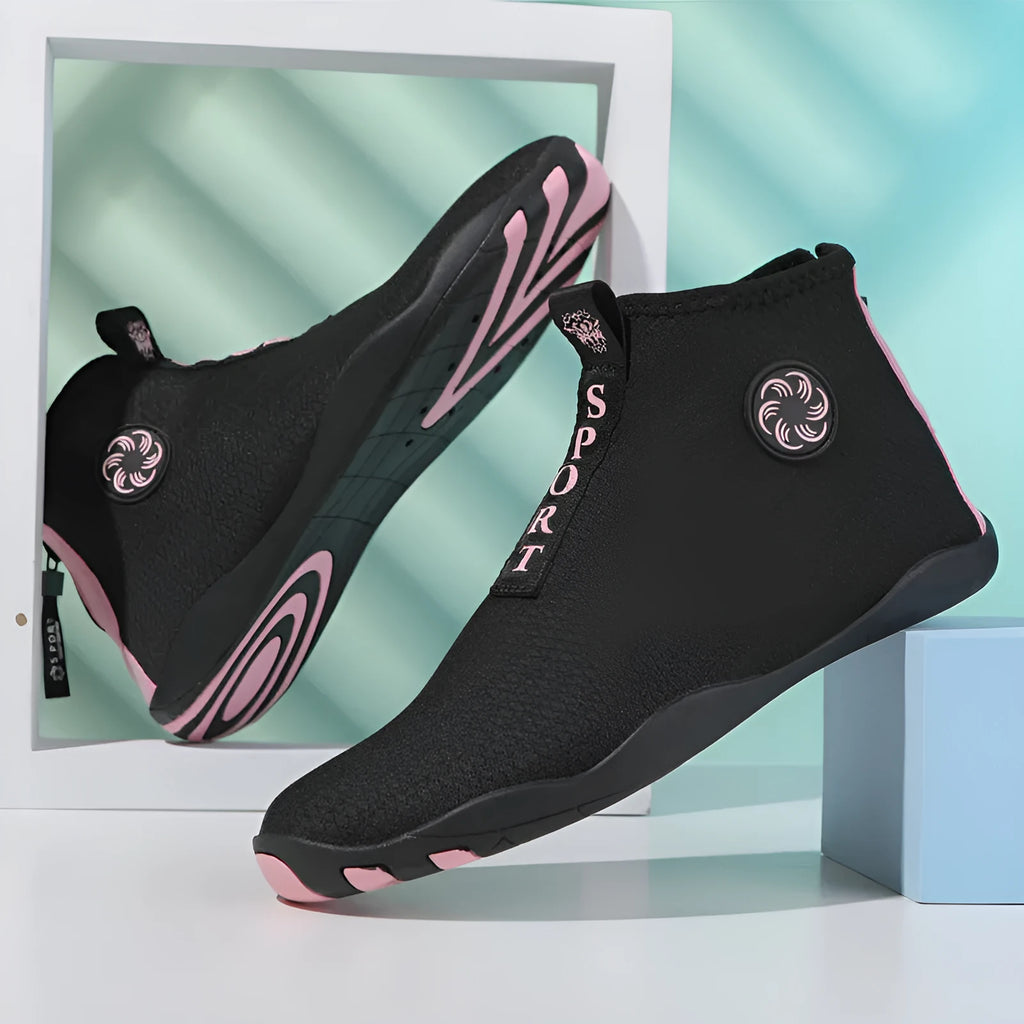 Black and fluorescent green mid-top beach shoes with mesh upper and rubber sole