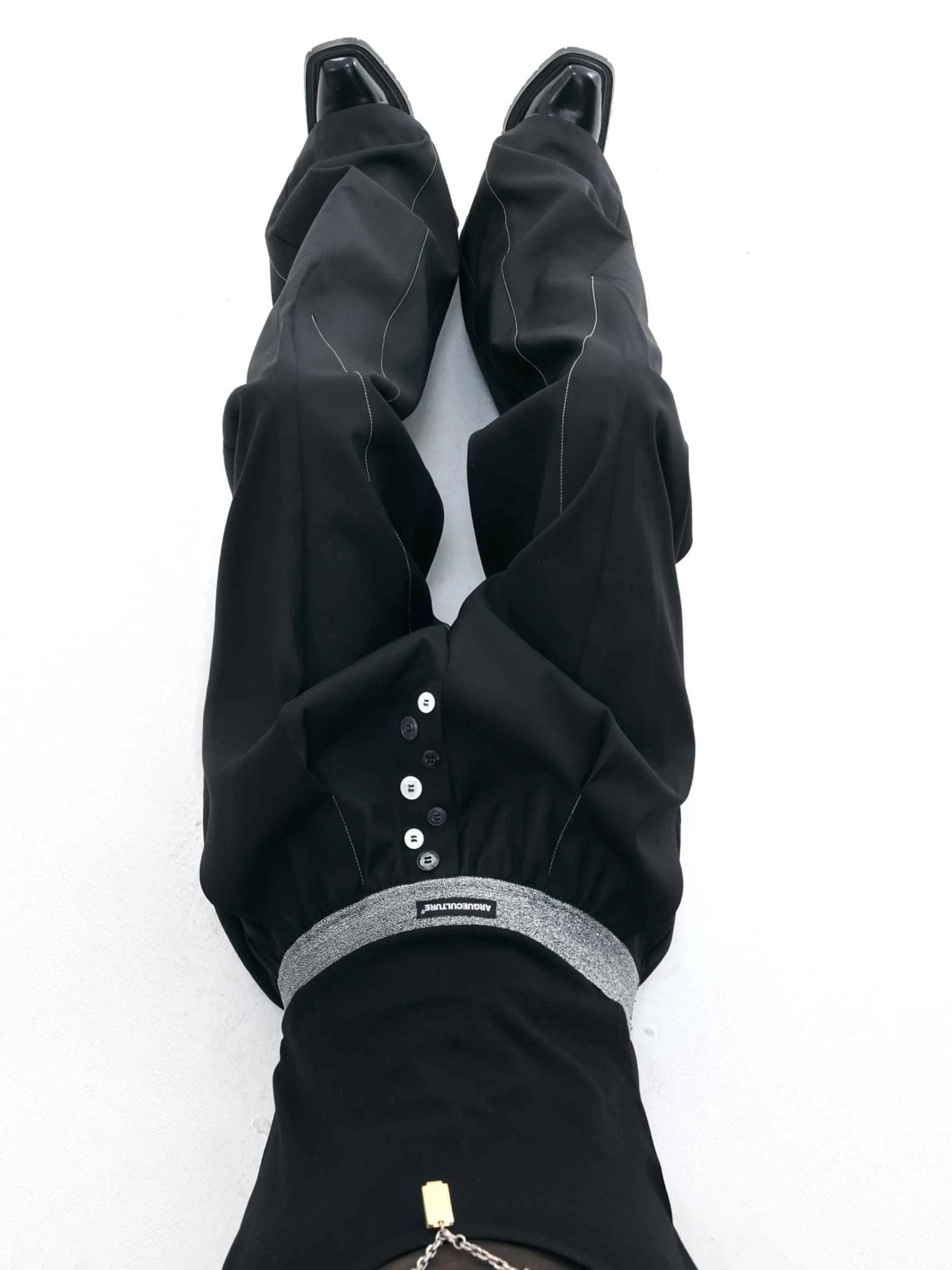 Straight-leg suit pants with button detail on leg in black or grey colour