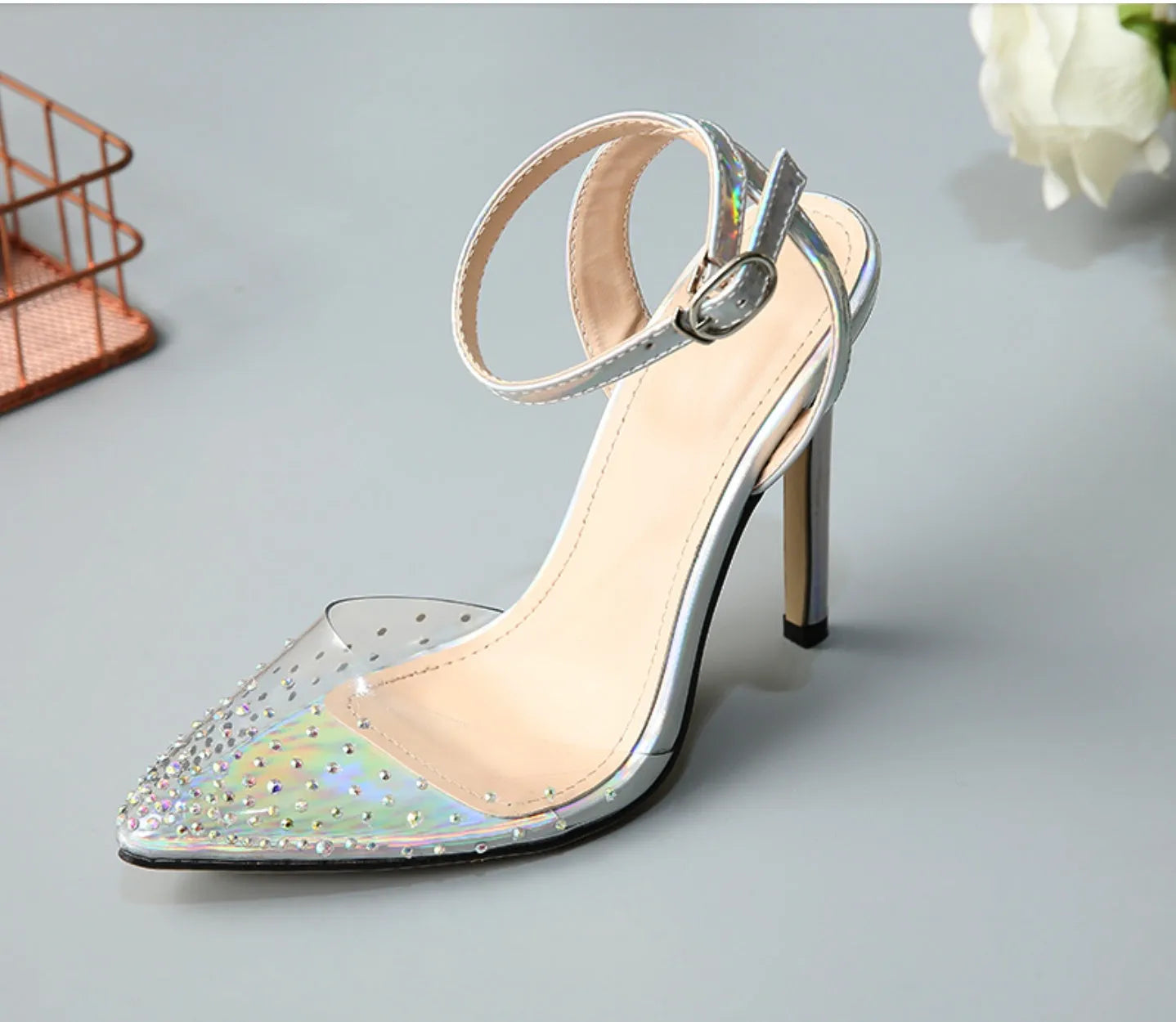 Women's pointed diamond pattern sandals with a stiletto heel, shown in size 38 with a PVC upper.