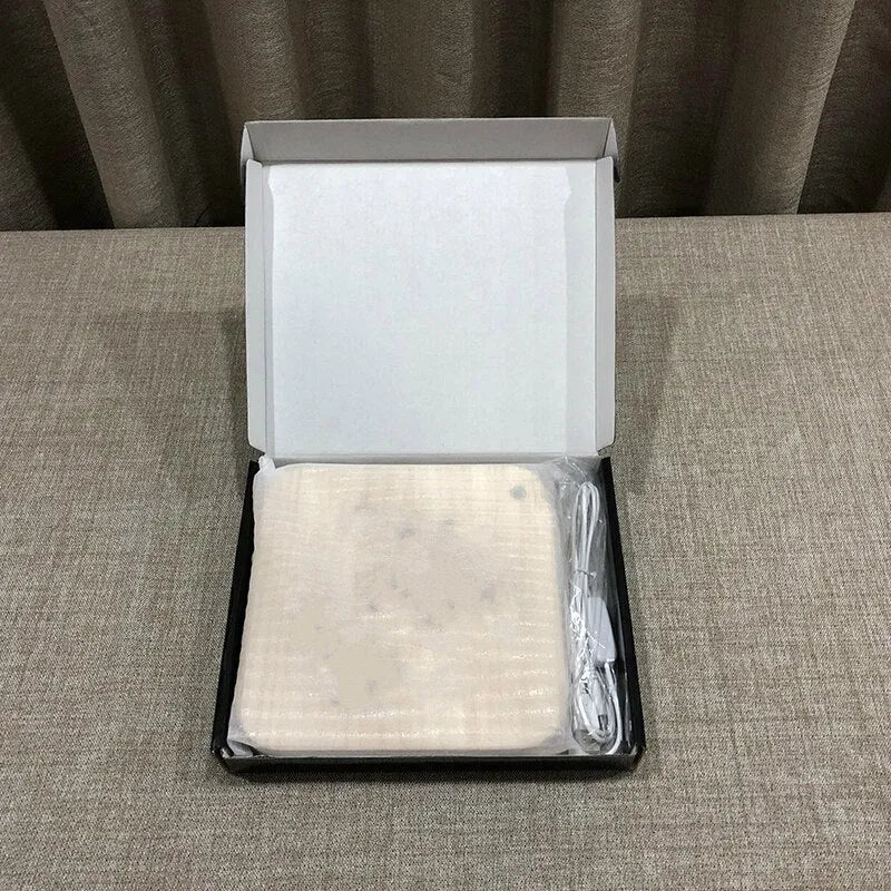 Square pine wood USB LED atmosphere lamp emitting warm white light from its 3D design.