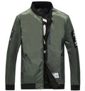 Reversible men's thin flight jacket in black with striped pattern, shown with zip front and collarless design.