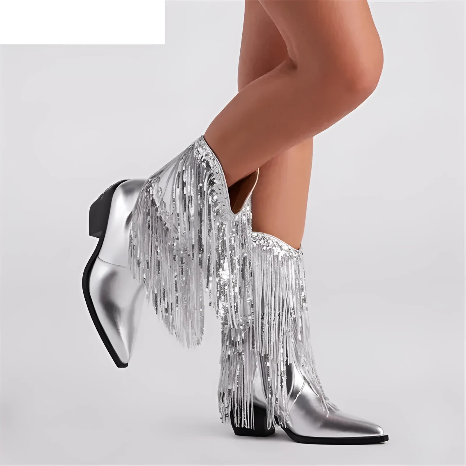 Women's black chunky high heel tassel boots with pointed toe on a white background.