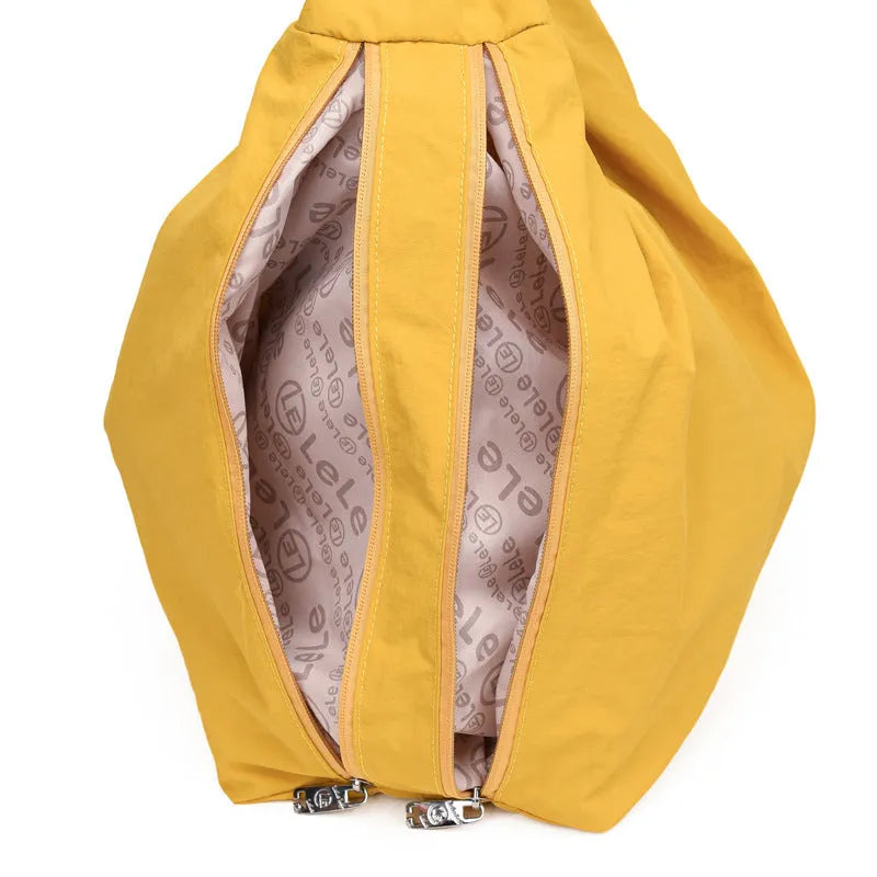 Heart-shaped nylon underarm bag for women in black, blue, khaki, and yellow colour options