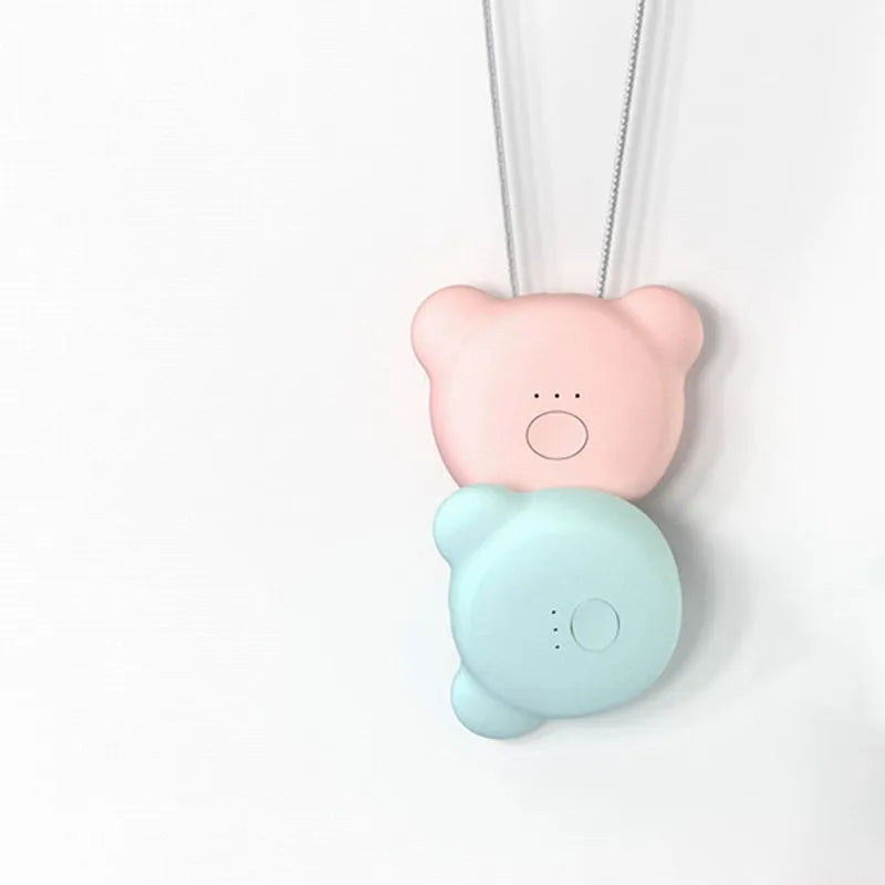 USB rechargeable mini air purifier necklace in blue, showing compact design worn around neck.
