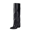 Women's black thick high heel winter boots with decorative stitching and high shaft