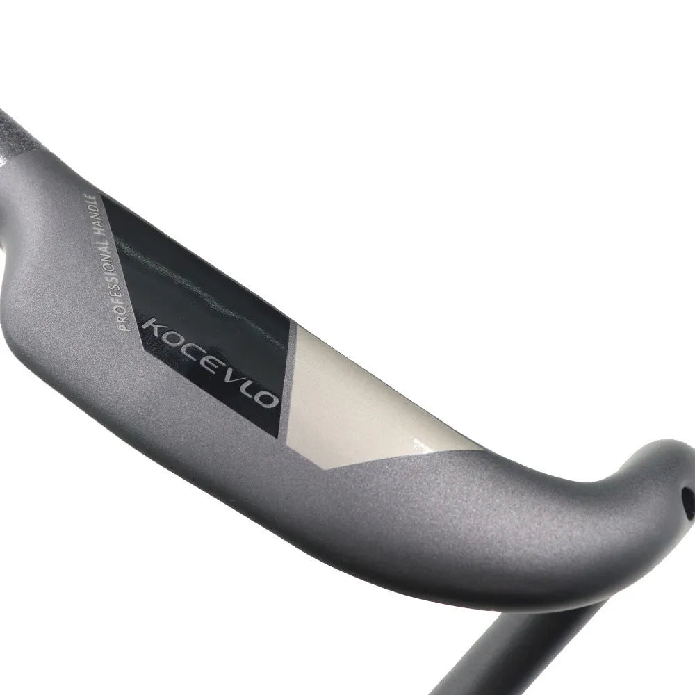 Matt carbon fibre road bike drop handlebar shown in bent shape with size options