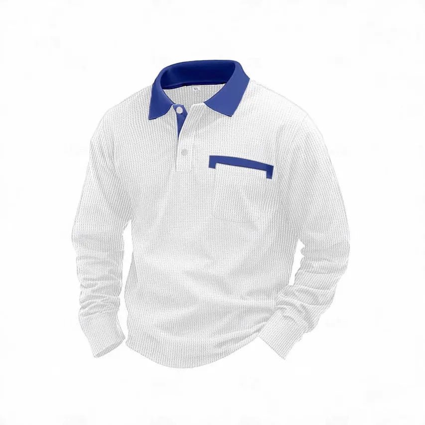 Man wearing a loose-fit long-sleeved polo shirt with a waffle knit texture in a dark blue colour.