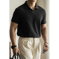 Man's blue short-sleeved cotton blend polo shirt with a collar, regular fit for summer.