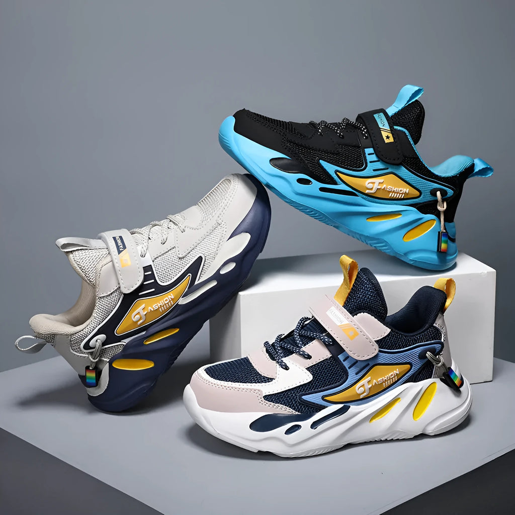 Boys' dark blue and light blue sports running shoes with Velcro strap and mesh upper.