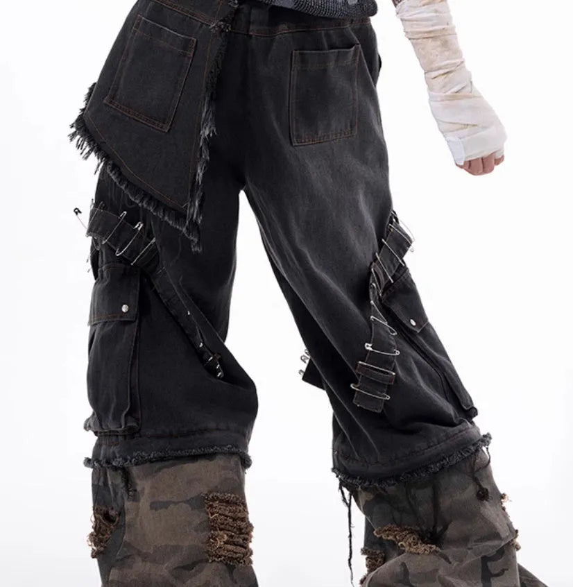 Grey men's camouflage jeans with splicing construction and pin details on cotton denim fabric