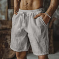Men's cotton linen casual shorts in straight leg British style, shown in army green colour.