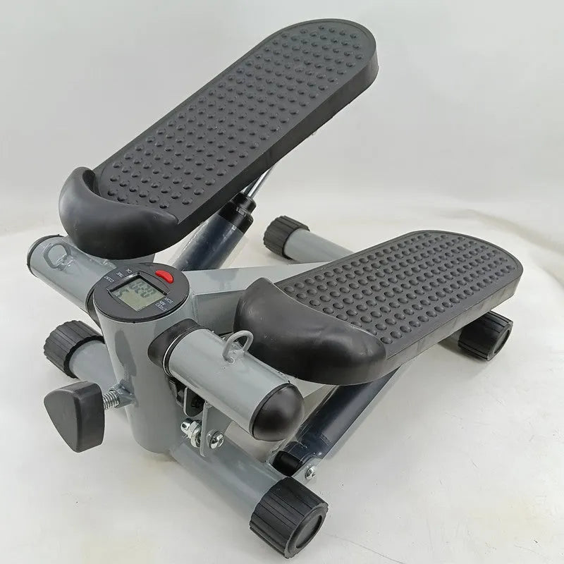 Silver grey household mini treadmill waist slimming machine with hydraulic resistance system.