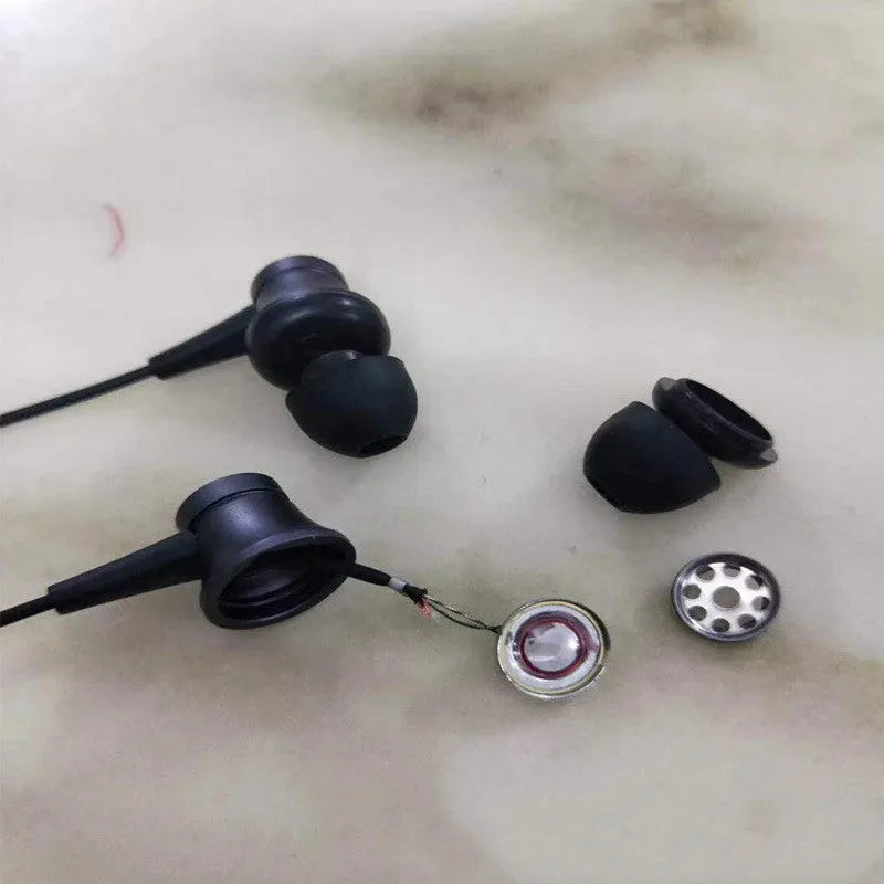 Piston-style in-ear wired headphones with 3.5mm jack in black, blue, and red colour options.