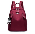 Medium wine red Oxford cloth rucksack with double straps and external digging pocket