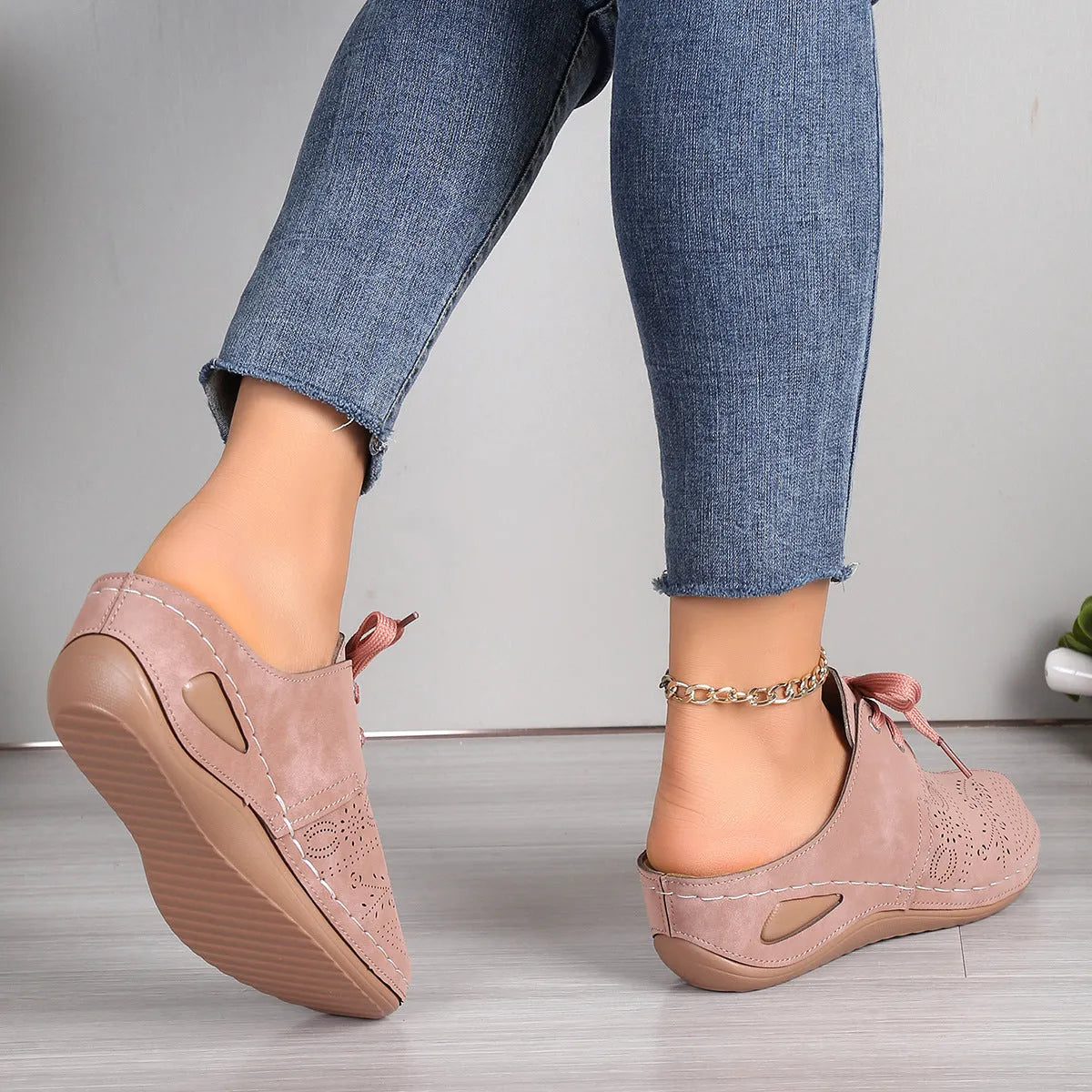 Women's baotou lace-up slippers with hollow-out wedge design in suede and rubber construction
