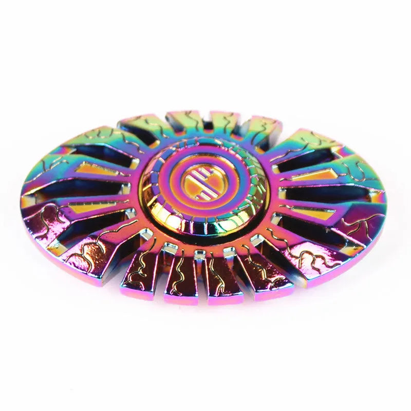 Colourful alloy fidget spinner with six axis design and electroplated finish on a light background