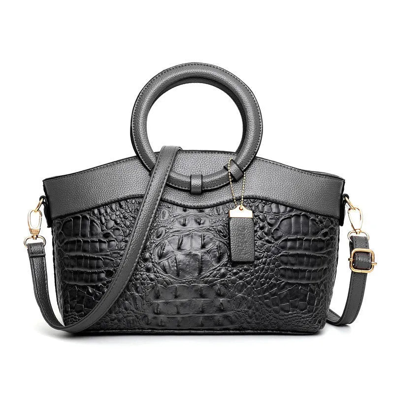 Women's casual fabric shoulder bag in multiple colours with zipper compartments and phone pocket.