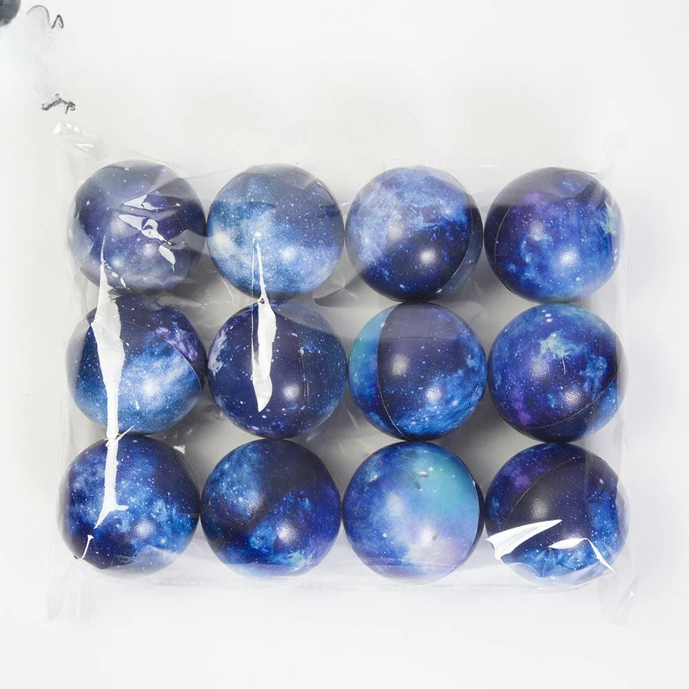 Set of eight solar system planet stress balls plus moon and sun in soft PU foam on white background