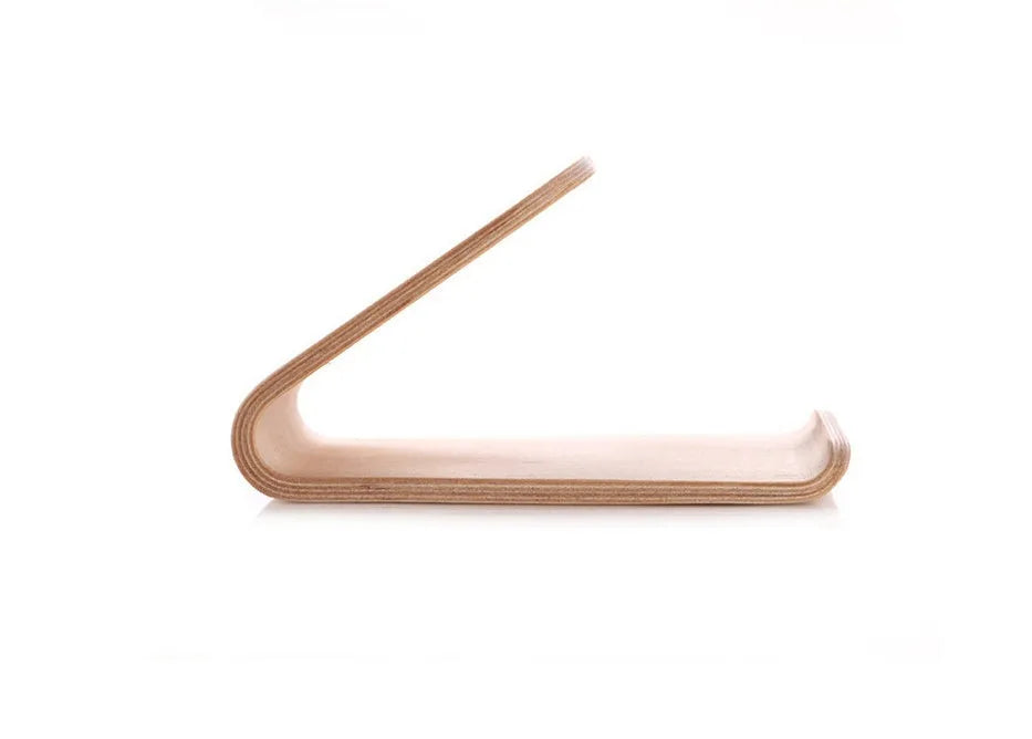 A wooden phone stand holding an iPhone in landscape mode on a desk.