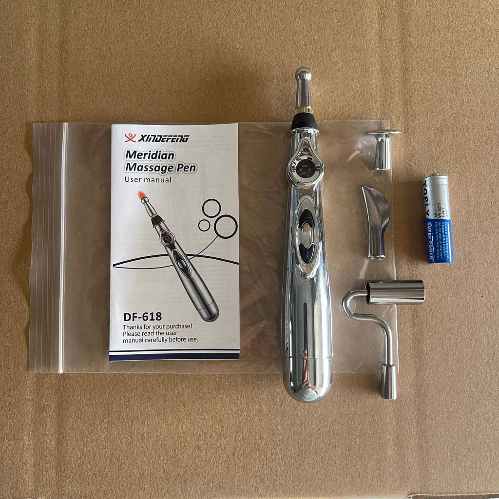 USB rechargeable meridian pen with automatic acupoint detection and five-headed oil applicator in black bagged packaging